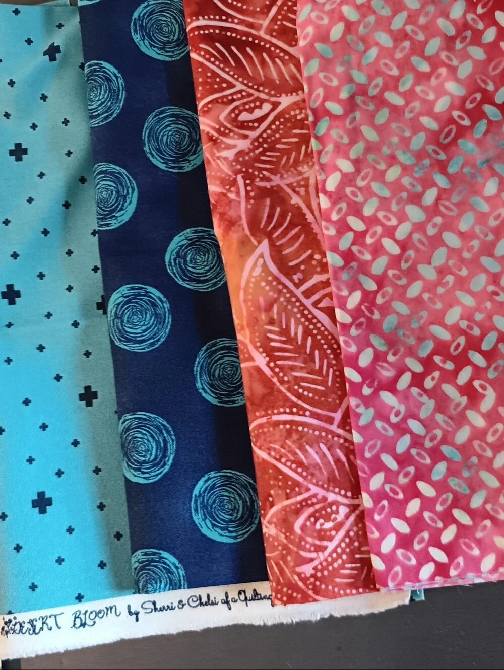 Fabric coordinating prints cotton = 3 yards  + buttons (set)
